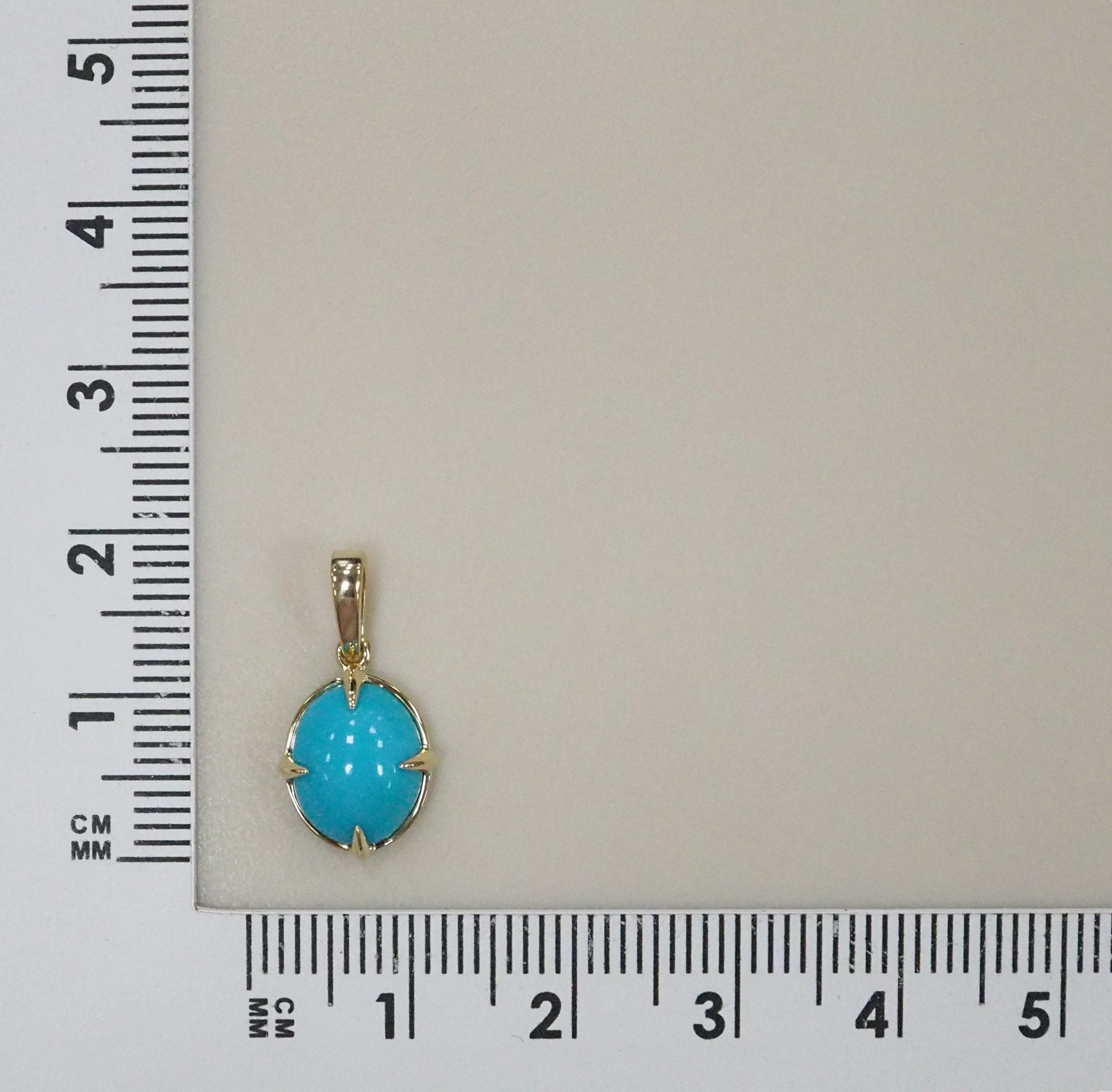 Подвеска из желтого золота с бирюзой